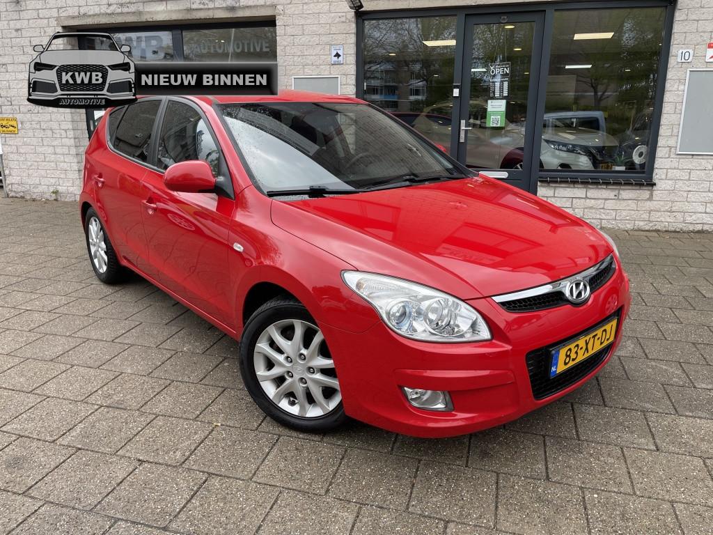 Hyundai i30 1.6i Style 5Drs Airco Trekhaak Half leer, Auto's, Gebruikt, 1591 cc, 4 cilinders, Origineel Nederlands