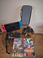 Nintendo Switch met 2 spellen in goede staat., Spelcomputers en Games, Ophalen of Verzenden, Zo goed als nieuw, Met 2 controllers