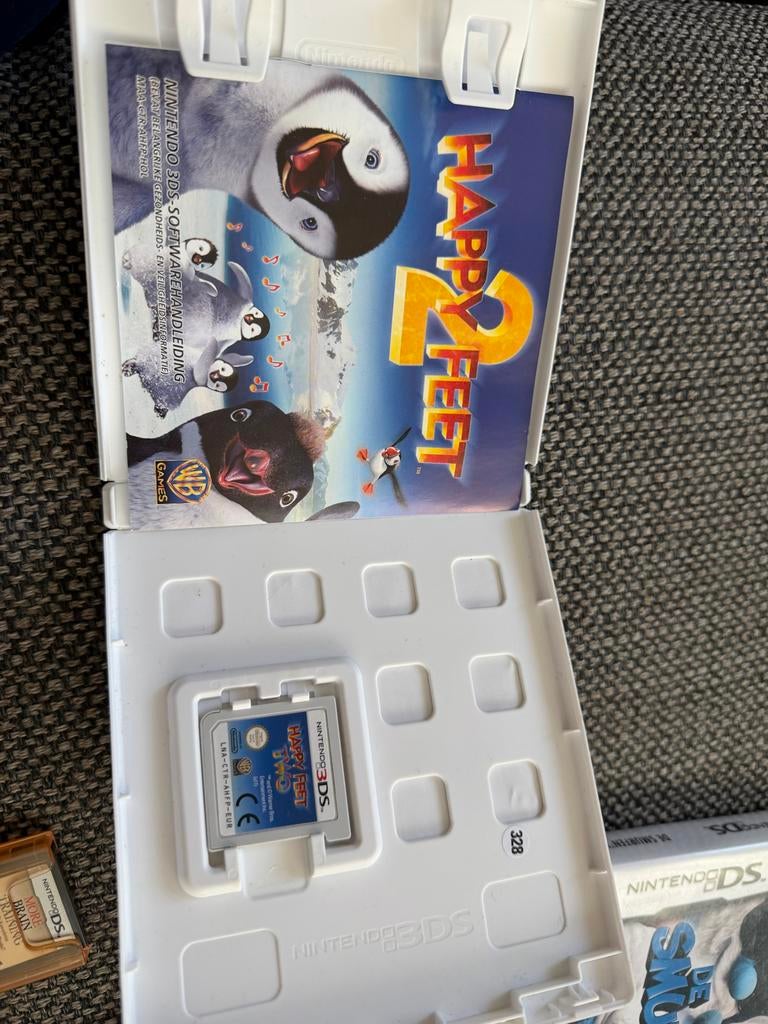 5 Nintendo DS Spelletjes: Happy Feet 2, Smurfen, Dora en mee, Avontuur en Actie, Gebruikt, 1 speler, Ophalen of Verzenden