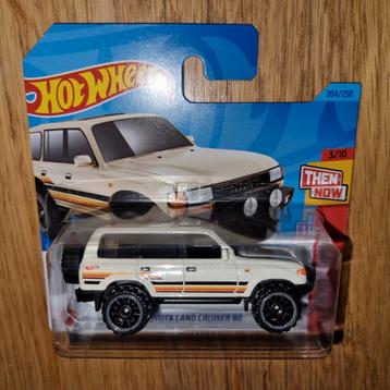 596 - Hotwheels Toyota Land Cruiser in verpakking.  beschikbaar voor biedingen