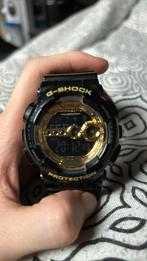 G-shock goud zwart, Sieraden, Tassen en Uiterlijk, Horloges | Heren, Casio, Goud, Gebruikt, Kunststof