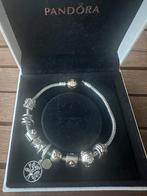 PANDORA armband met 14k goud en zirconia., Sieraden, Tassen en Uiterlijk, Armbanden, Ophalen of Verzenden, Zo goed als nieuw, Goud
