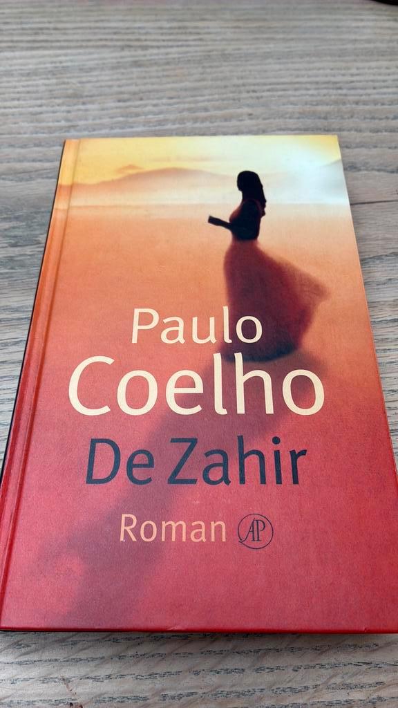 Paulo Coelho - De Zahir, Boeken, Literatuur, Gelezen, Ophalen of Verzenden
