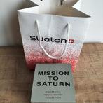 Omega x Swatch Moonswatch - Mission to Saturn (Compleet), Sieraden, Tassen en Uiterlijk, Horloges | Heren, Kunststof, Nieuw, Kunststof