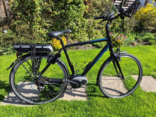 Koga elektrische herenfiets, Fietsen en Brommers, Elektrische fietsen, Zo goed als nieuw, Overige merken, 55 tot 59 cm, 50 km per accu of meer