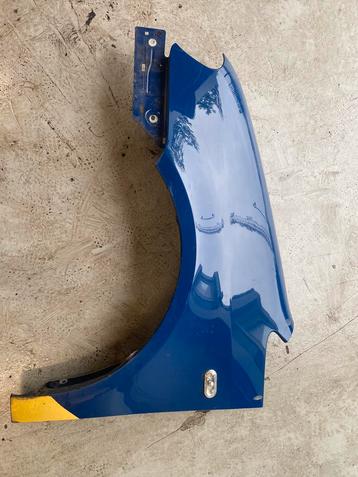 Vw caddy 2004/2010 voorscherm spatbord links blauw beschikbaar voor biedingen