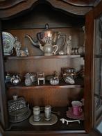 Antieke Zilveren Collectie in Vitrinekast, Ophalen