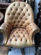 Een chesterfield bureelstoel, Ophalen