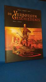 De Verborgen Geschiedenis, deel 1 + Genesis, hardcover. K1, Boeken, Eén stripboek, Ophalen of Verzenden, Gelezen