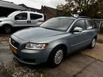 Volvo V50 1.6 D 2010 Blauw APK Mei 26, Auto's, Voorwielaandrijving, USB, Stof, Zwart