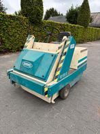 Tennant veegmachine, Ophalen