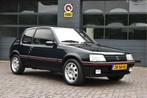Peugeot 205 1.9 GTI (bj 1991), Auto's, Voorwielaandrijving, Metallic lak, Zwart, Leder en Stof