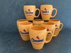 8 Chocomel  bekers / mokken, 9,5 cm hoog, 1 kant bedrukt, Ophalen, Keramiek, Zo goed als nieuw, Overige stijlen