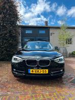BMW 1-Serie 114I 75KW 5-DR 2014 Zwart, Auto's, BMW, 1-Serie, 65 €/maand, Achterwielaandrijving, 4 cilinders