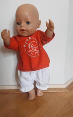 Te koop Babyborn pop met speciaal gemaakt ajax pakje, Maat XL, Ophalen of Verzenden, Zo goed als nieuw