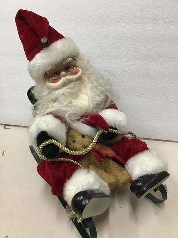 Zingende kerstman op slee beschikbaar voor biedingen