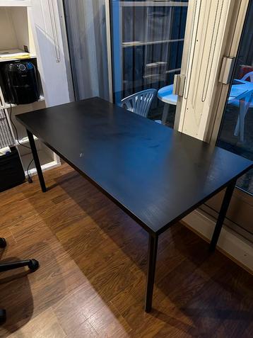 Black dining table and four chairs 