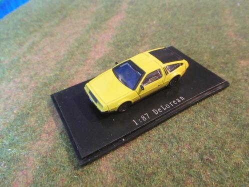 DMC DeLorean LK-81 - NPE geel, Hobby en Vrije tijd, Modelauto's | 1:87, Nieuw, Auto, Herpa, Ophalen of Verzenden