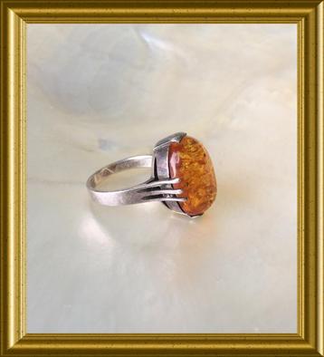 Mooie zilveren ring met barnsteen, amber
