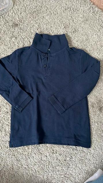 Donkerblauwe polo met langen mouwe. beschikbaar voor biedingen