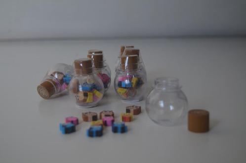 Klein flesje met gummetjes, Kinderen en Baby's, Speelgoed | Overig, Nieuw, Jongen of Meisje, Ophalen