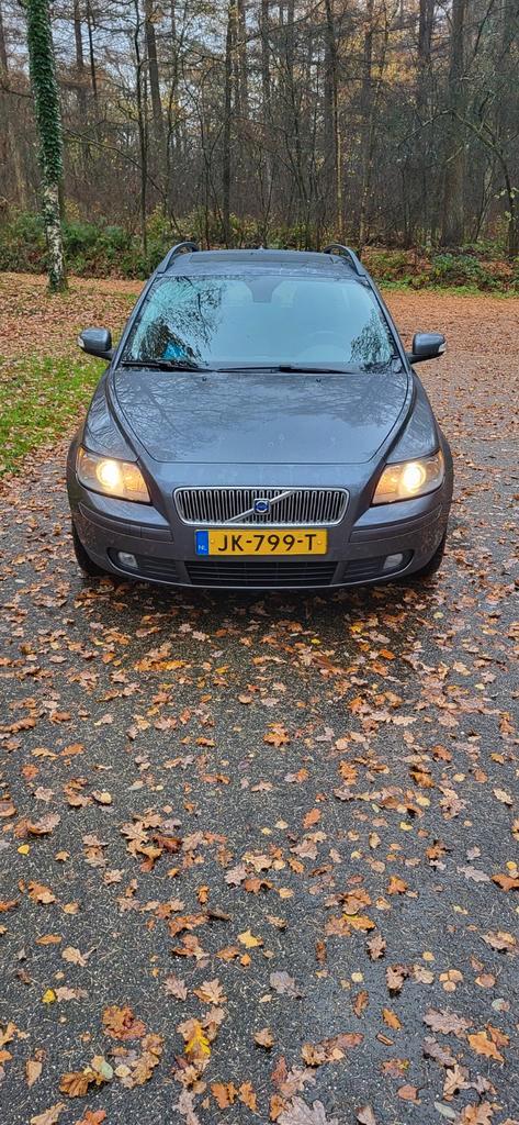 Volvo V50 2.4 140PK Geartronic 2007 Grijs, Auto's, Volvo, Particulier, V50, Benzine, E, Stationwagon, Automaat, Geïmporteerd, Zilver of Grijs