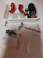 Onderdeel van alles wat  opel kadett burago banden, Hobby en Vrije tijd, Modelauto's | 1:24, Ophalen of Verzenden, Zo goed als nieuw