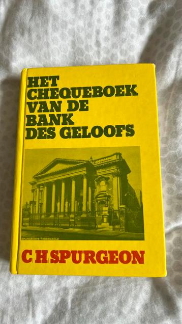 Het chequeboek van de bank des geloofs beschikbaar voor biedingen