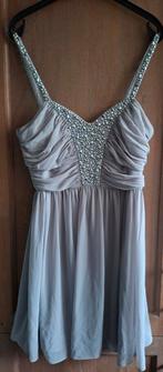 Cocktailjurk van Jane Norman maat 40 met glitterstenen nieuw, Maat 38/40 (M), Ophalen of Verzenden, Knielengte, Grijs