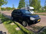Hyundai Tucson 2.0 I 2WD 2006 Zwart, Auto's, Stof, Zwart, 4 cilinders, Zwart