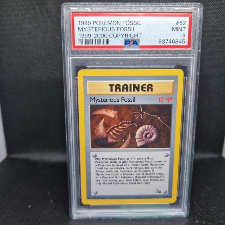 Mysterious Fossil 1999-2000 Copyright Fossil PSA 9, Hobby en Vrije tijd, Verzamelkaartspellen | Pokémon, Zo goed als nieuw, Ophalen of Verzenden