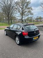 BMW 1-serie 116I Sport Line I Aut | 2012 | Camera | Trekhaak, 65 €/maand, Zwart, 4 cilinders, Zwart