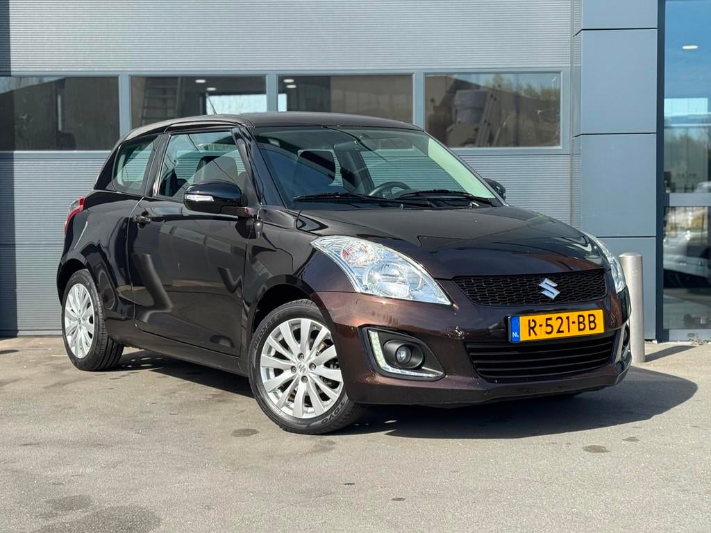 Suzuki Swift 1.2 Comfort EASSS Airco|Cruise|1e Eigenaar, Auto's, Voorwielaandrijving, Stof, Gebruikt, Bruin