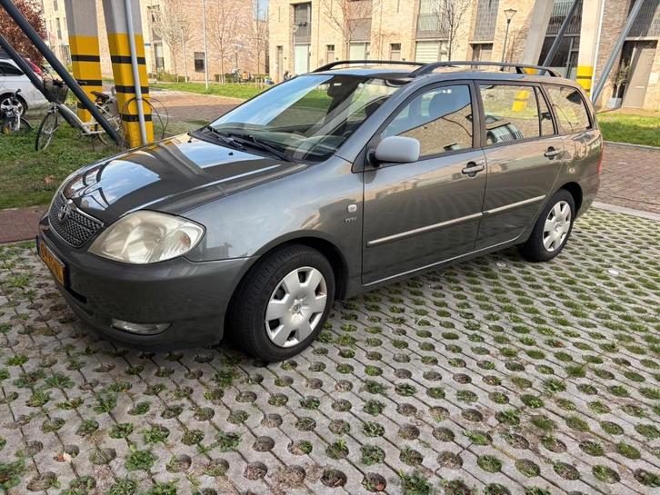 Toyota Corolla 1.6 Vvt-i Wagon Linea SOL 2004 Grijs, Auto's, Toyota, Particulier, Corolla, Airbags, Airconditioning, Alarm, Centrale vergrendeling