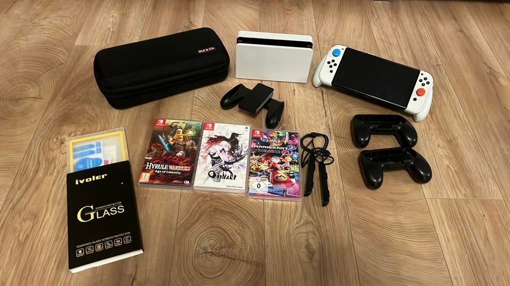 Nintendo Switch OLED met 3 spellen en accessoires, Overige genres, 1 speler, Ophalen of Verzenden, Zo goed als nieuw