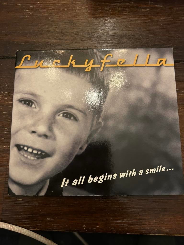 Lucky Fella / it all begins  whit a smile, Ophalen of Verzenden, Zo goed als nieuw