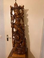 Indonesisch beeld met tafel, Ophalen