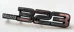 MAZDA 323 logo merk  embleem, Ophalen of Verzenden, Gebruikt, Auto's