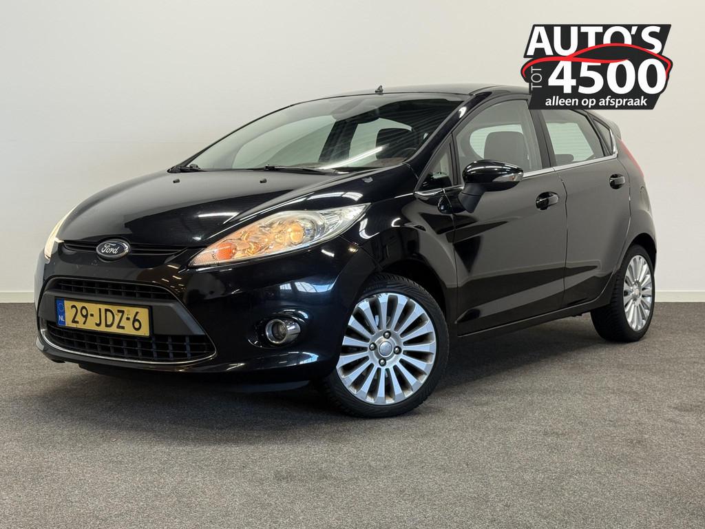 Ford Fiesta 1.4 Titanium Clima!, Auto's, Ford, Voorwielaandrijving, Stof, Zwart, Origineel Nederlands