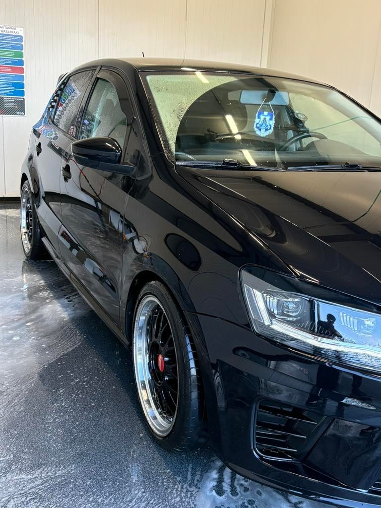 Volkswagen Polo 1.2 TSI 66KW 2013 Zwart, Voorwielaandrijving, Euro 5, Stof, 40 €/maand