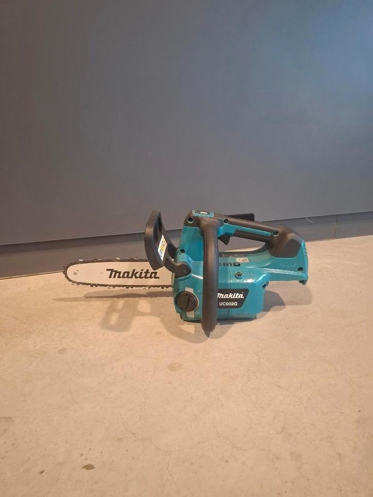 Makita UC002GZ accu kettingzaag, Tuin en Terras, Hand-tuingereedschap, Zo goed als nieuw, Overige soorten, Ophalen of Verzenden
