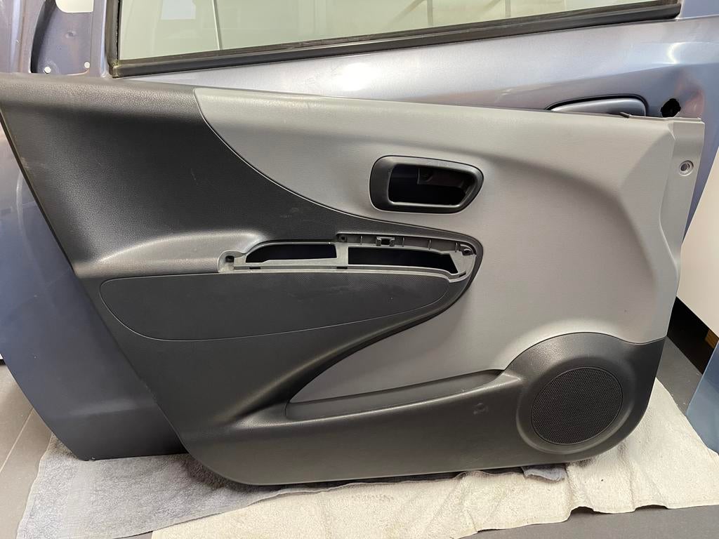 Deurpaneel suzuki alto/ nissan Pixo, Auto-onderdelen, Interieur en Bekleding, Ophalen, Nissan