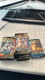 Pokemon boosters cosmic eclipse/ evolutions / rebel clash, Hobby en Vrije tijd, Verzamelkaartspellen | Pokémon, Ophalen of Verzenden