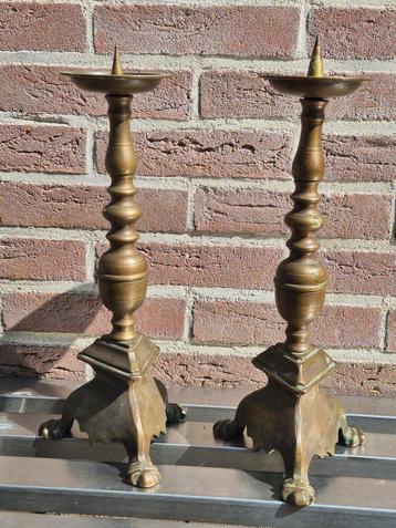 2 messing of koperen kandelaren te koop beschikbaar voor biedingen