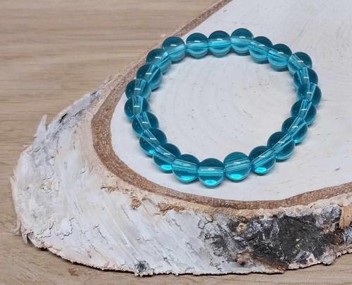 armbandje licht blauwe kralen, Sieraden, Tassen en Uiterlijk, Armbanden, Overige materialen, Blauw, Met bedels of kralen, Ophalen of Verzenden