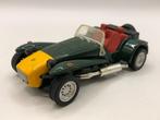NewRay Caterham Super Seven groen+geel -MATIG- M25, Overige merken, Auto, Nieuw, Ophalen of Verzenden