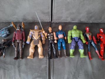 9 Marvel action poppen  beschikbaar voor biedingen