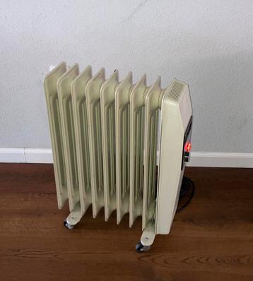 Olie radiator elektrisch, heerlijk warm beschikbaar voor biedingen