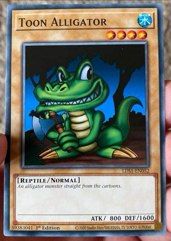Yu-Gi-Oh! Toon Alligator LDS1 1st Edition !, Hobby en Vrije tijd, Verzamelkaartspellen | Yu-gi-Oh!, Zo goed als nieuw, Losse kaart