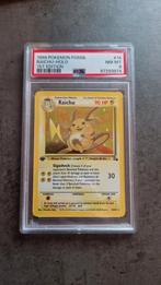 Raichu Holo 1st Edition Fossil PSA 8, Hobby en Vrije tijd, Verzamelkaartspellen | Pokémon, Ophalen of Verzenden, Zo goed als nieuw